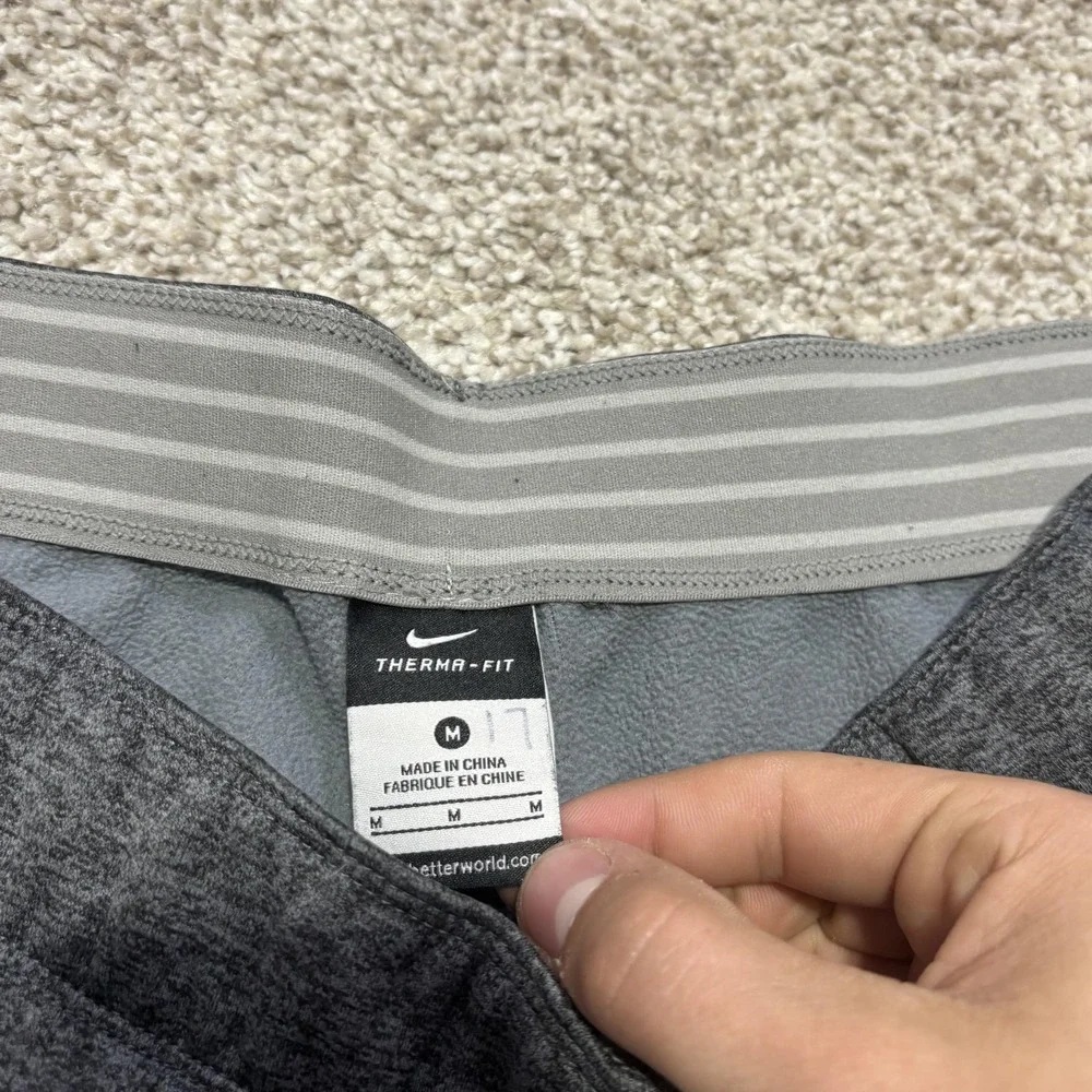 Nike Therma-FIT Pants Mens Medium Gray Fleece‎ Track Zip Hem Pockets Athletic